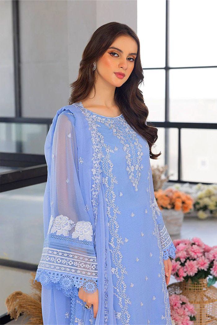 "AZURE 5177 sky blue lawn suit model closeup showing heavy embroidery on neckline and sleeves with cotton net dupatta"