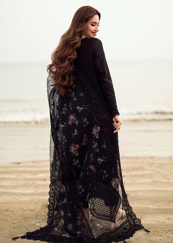Back view of Sana Javed wearing NUREH black lawn suit showing dupatta drape