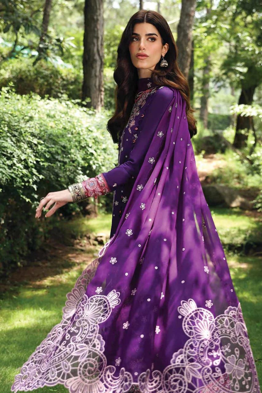 "Model wearing QALAMQAR purple lawn suit with flowing chiffon cutwork embroidered dupatta in garden setting"