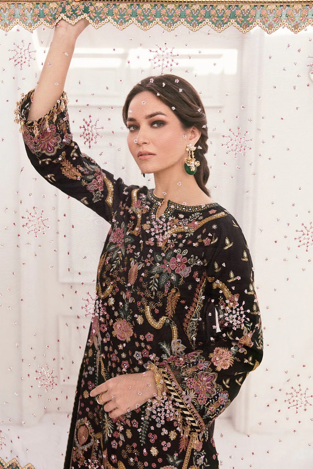 "Close-up of embroidered daman with handmade tassels and matching crape trouser border – Baroque bridal collection"